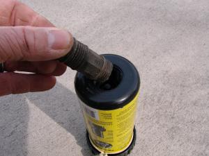 a Bethesda Sprinkler Repair contractor repairs a broken sprinkler head riser